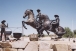 "Come and Get It" horse and cowboy sculpture at Rawhide in Scottsdale, Arizona